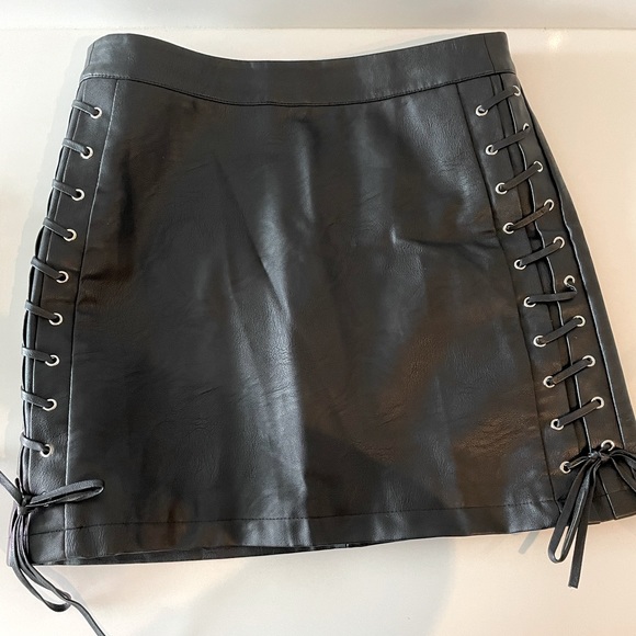 Topshop Dresses & Skirts - Top shop black vegan leather mini skirt